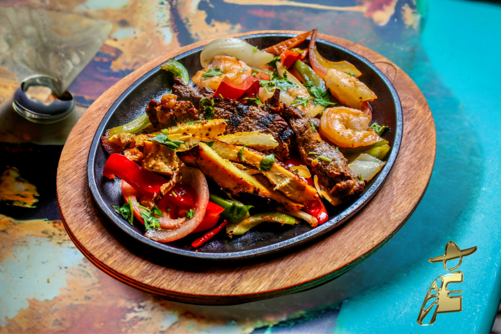 Delicious sizzling fajitas at Alero, a popular Mexican restaurant in Dupont Circle, featuring fresh ingredients and bold, authentic flavors